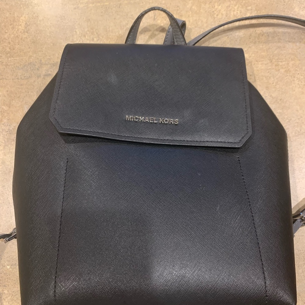 Authentic Michael Kors backpack purchased from Macys lastyear for $180 Like new